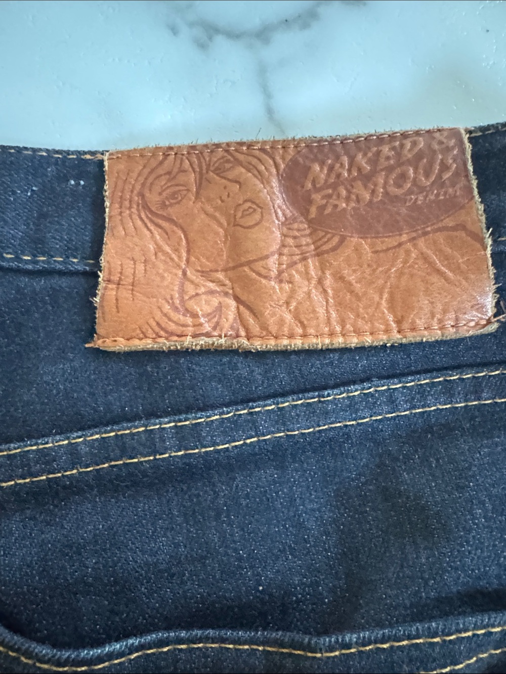 Naked & Famous Denim Men's Indigo Skinny Guy Jeans with Brown Leather Patch